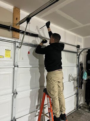 Garage door torsion spring repair